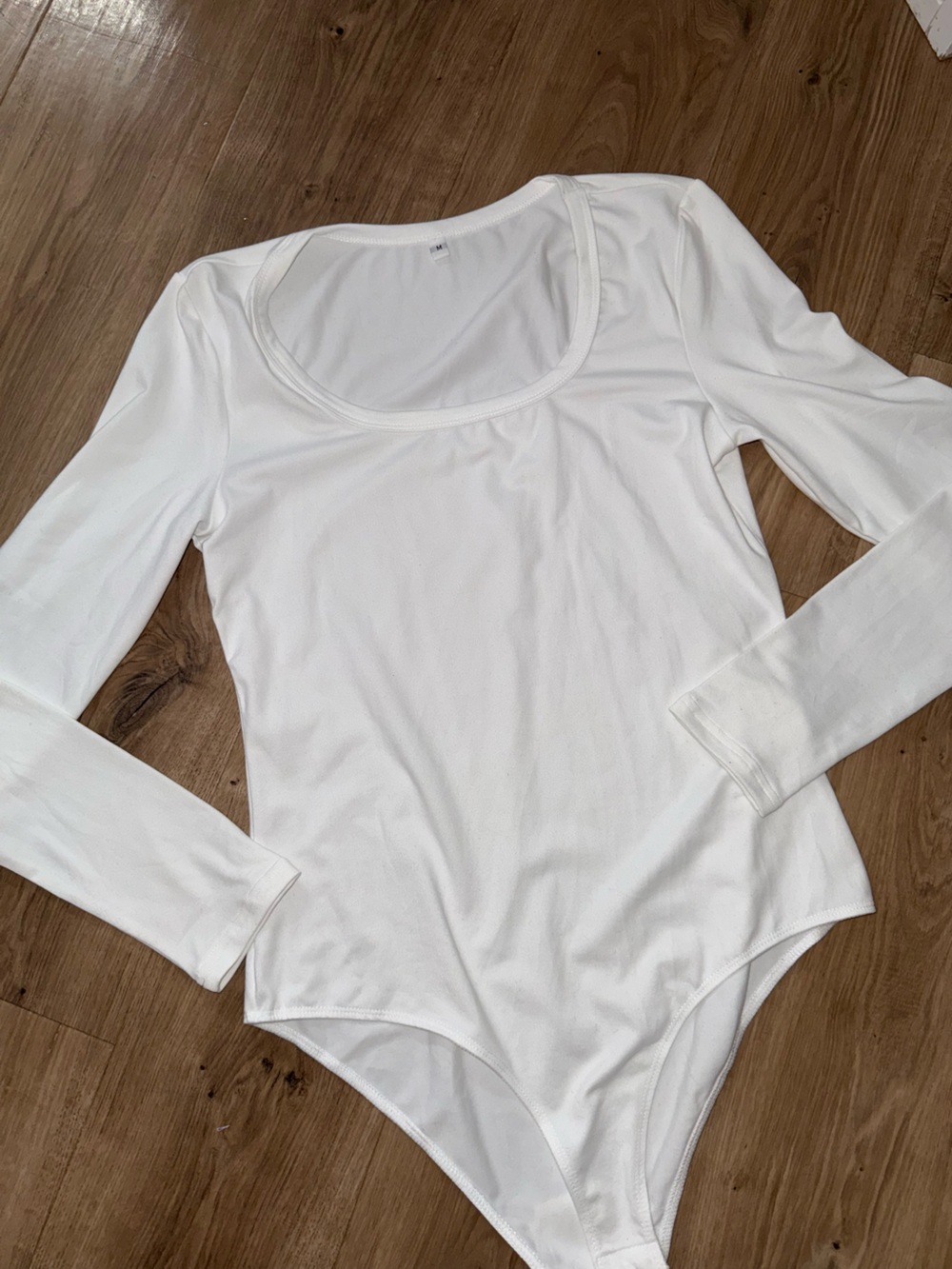Brand new white bodysuit